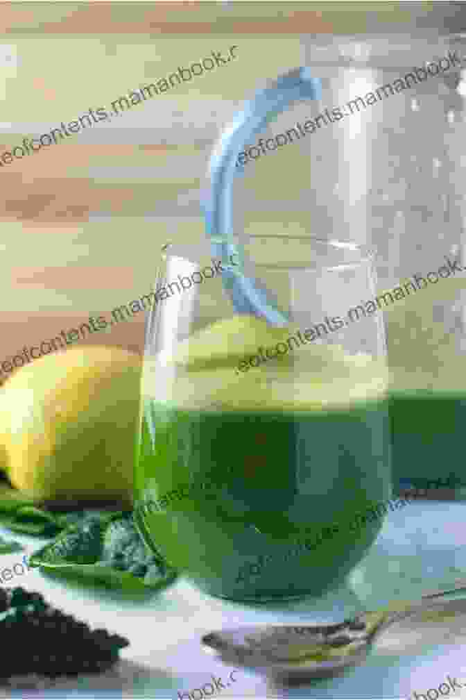 A Green Smoothie Made With Celery Juice, Spinach, Kale, Ginger, And Lemon, Topped With Chia Seeds And A Strawberry Easy Celery Juice Recipes Melody Rogers